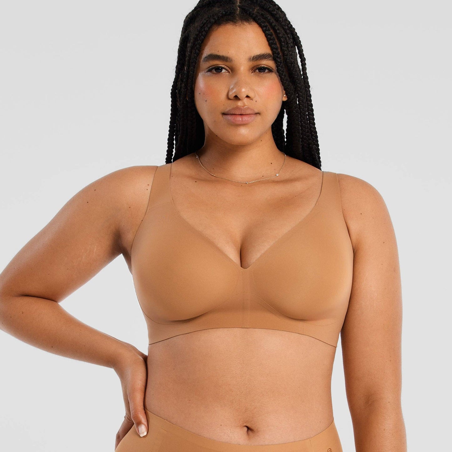 Starlette Plunge Bra showing deep plunge neckline and seamless construction in color Mica
