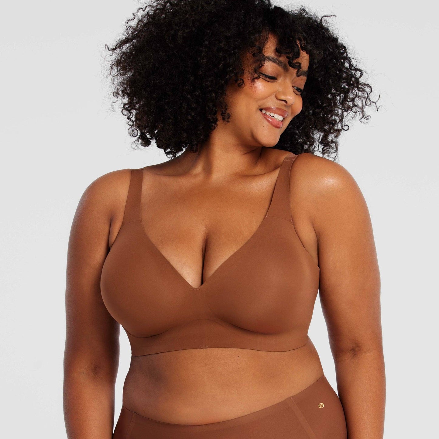 Starlette Plunge Bra showing deep plunge neckline and seamless construction in color Clay
