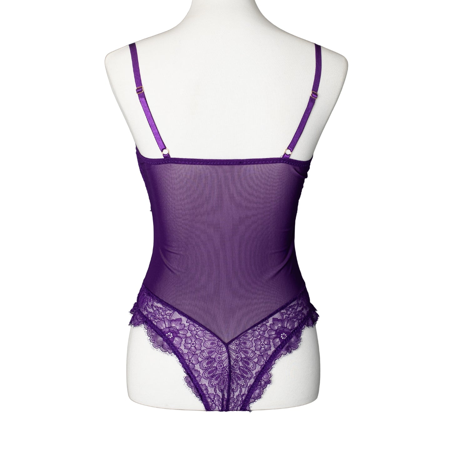 Back of purple lace and mesh thong bodysuit