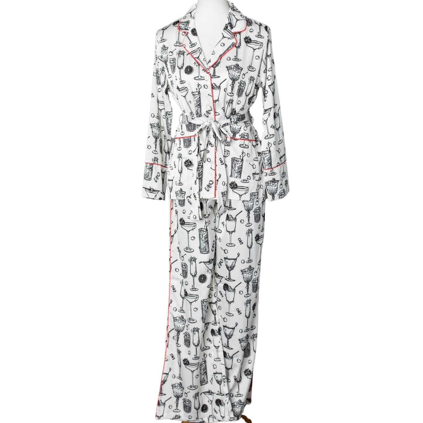 Front view of a satin pajama set printed with cocktail glasses on it