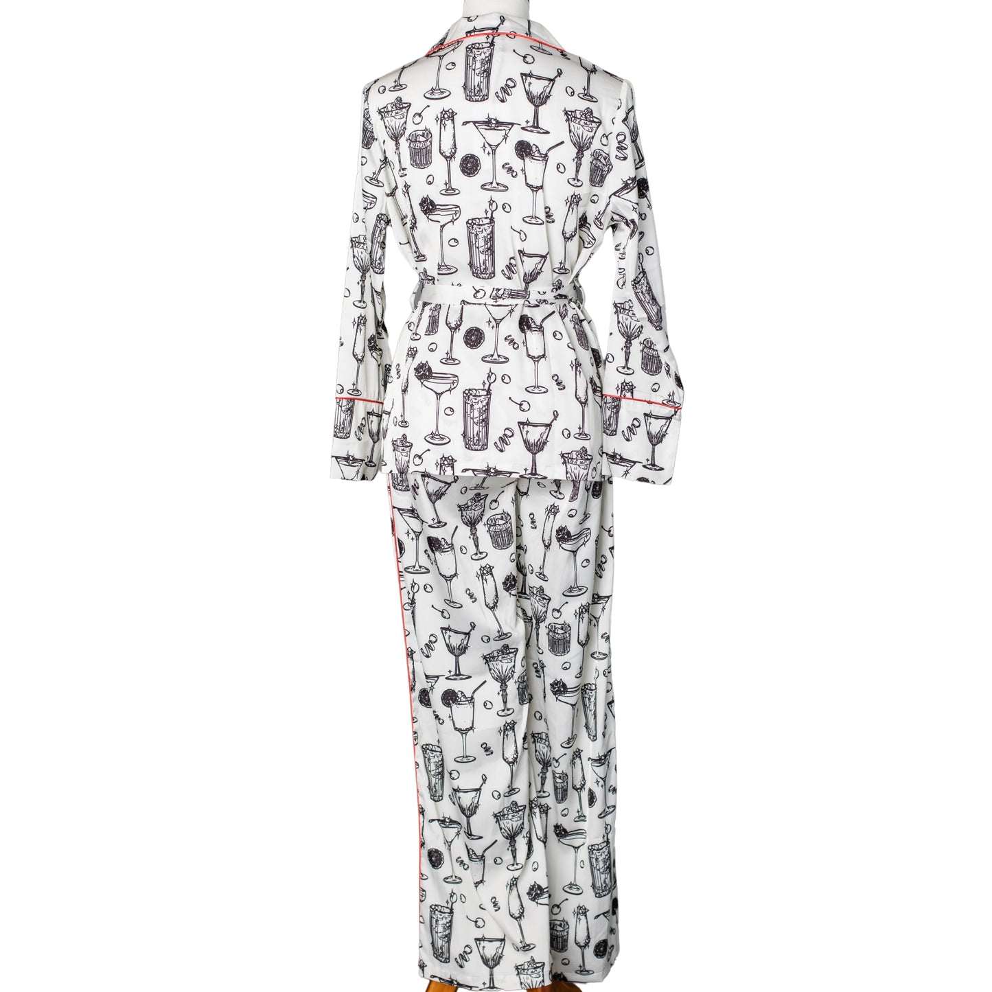 Back view of a satin pajama set printed with cocktail glasses on it