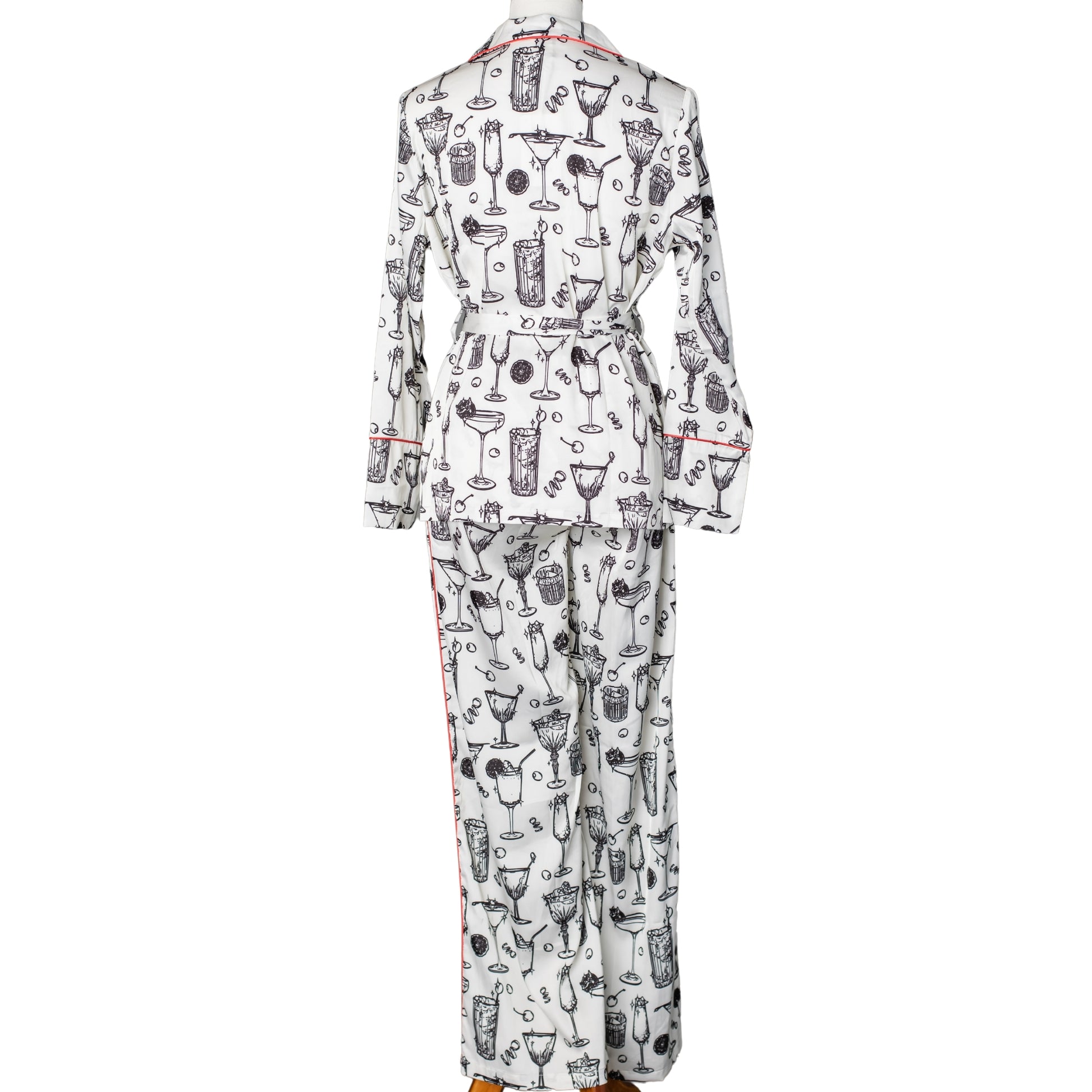 Back view of a satin pajama set printed with cocktail glasses on it